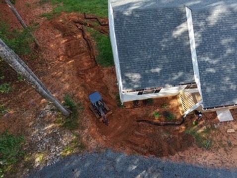 Completed landscape installation with plantings and hardscaping